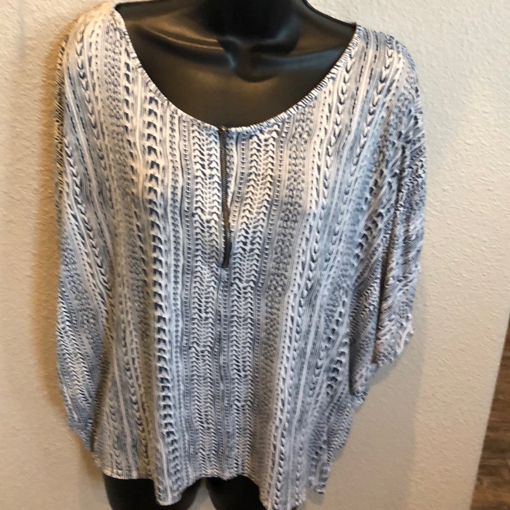 T shirt with dolman sleeves.